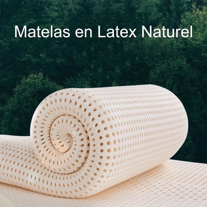 Close-up of natural latex foam showing perforated breathable texture